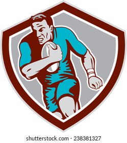 Illustration of a rugby player holding ball running charging set inside shield crest on isolated background done in retro style. 