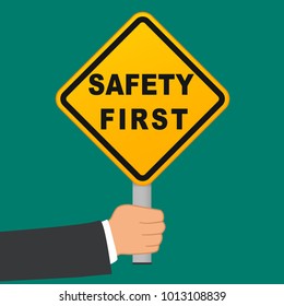 Illustration of safety first sign in hand concept
