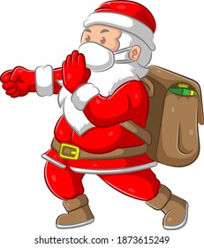 The illustration of the Santa clause bringing the big bag of gift