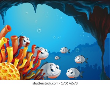 Illustration of a school of fish inside the sea cave