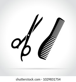 Illustration of scissors and comb black icons