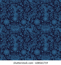Illustration of seamless floral doodle pattern with lacy ornament in blue colors