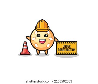 illustration of sesame ball with under construction banner , cute design