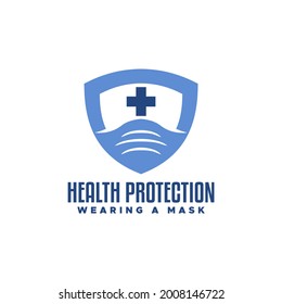 illustration of shield emblem with the image of a mask and a cross shape. good for medical mask business logo