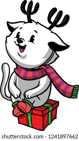 The illustration shows an white kitty that wears reindeer horns. He is climbed on top of a gift box and he wears a warm scarf and a pair of red boots.  