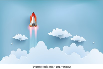 
illustration of the shuttle. flying across beautiful clouds at full speed. paper art design