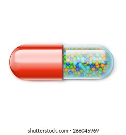 illustration of single pill lying on white background with granules inside