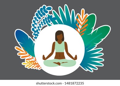 Illustration of sticker with of a woman with dark skin who is doing yoga and meditating in lotus pose. Around is a frame with multi-colored tropical leaves and feathers.