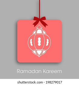 Illustration of stylish tag,sticker,label or greeting card of arabic lamp for celebration of Ramadan Kareem and Eid Mubarak.