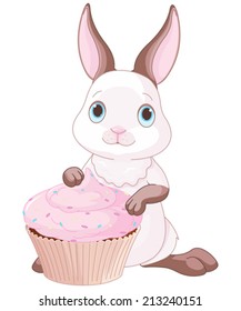 Illustration of Sweet bunny holds cupcake