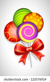 illustration of sweet colorful lollipop wrapped in ribbon