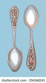 Illustration of teaspoons  on blue background.