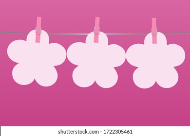 Ilustración de tres postales blancas en las pinzas de tela en las que se puede felicitar por la fiesta o la publicidad
