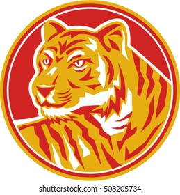 Illustration of an tiger head prowling looking to the side viewed from front set inside circle on isolated background done in retro style. 