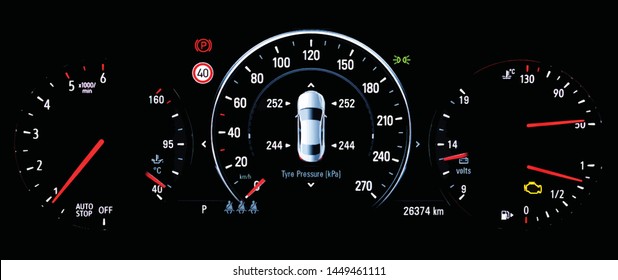 Illustration of TPMS (Tyre Pressure Monitoring System) monitoring display on car dashboard panel. The pressure measurement given in kPa. Malfunction check engine warning light control on car dashboard