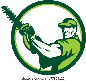 Illustration of a tree surgeon arborist gardener tradesman worker holding a hedge trimmer facing front set inside circle done in retro style on isolated white background.