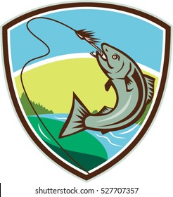 Illustration of trout biting hook lure viewed from the side set inside shield crest with river, trees and sun in the background done in retro style. 
