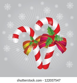 Illustration of two candy canes with bows on gray background.
