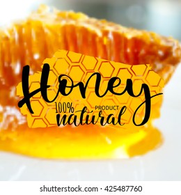 Illustration of vector hand drawn writing honey logo, label, badge in modern ink calligraphy style. Natural bee products. Yellow spot of honey with the bee and honeycomb logo