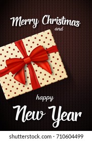 Illustration of Vector Marry Christmass Gift Card. Realistic Gift Box with Red Ribbon on top and Paper Lettering
