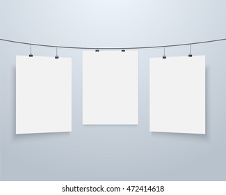 Illustration of Vector Poster Mockup. Realistic Vector EPS10 Paper Poster on Wire with Metal Clips on the Bright Wall