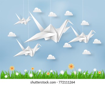 illustration vector of white origami paper bird flying on blue sky over field of grasses and flower with cloud, beautiful environment in paper art and craft style