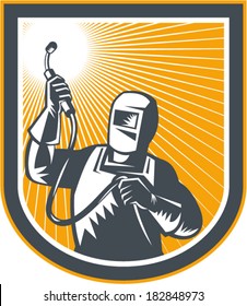 Illustration of welder fabricator worker holding up welding torch viewed from front set inside shield on isolated background done in retro style.