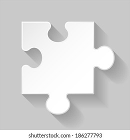 Illustration of white puzzle element with long shadow on grey background