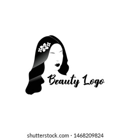 Illustration of woman with beautiful hair - can be used as a logo for beauty salon / spa
