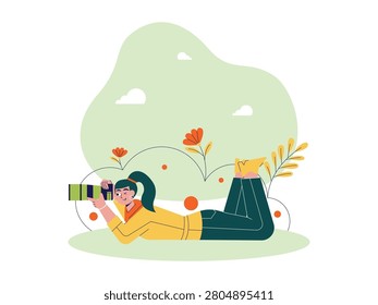 Illustration of woman lying down on the grass and take a picture looking through the lens camera