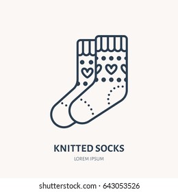 Illustration of woolen socks. Knitted clothing shop line logo. Vector flat sign for atelier or garment shop.