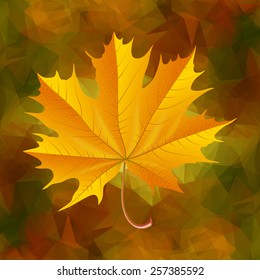 Illustration of yellow maple leaf on triangle background
