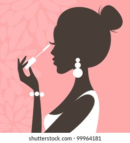 Illustration of a young beautiful woman applying mascara on her lashes.