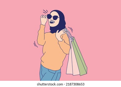 Illustrations of Beautiful muslim women with eyeglasses holding shopping bags