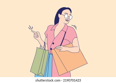 Illustrations of Beautiful young girl smiling with holding shooping bags after shooping in the mall