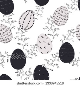 Illustrations of Easter decorative eggs pattern seamless. Black and white, modern design with herbs silhouette.