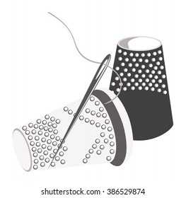 Image of black and white thimbles Needles