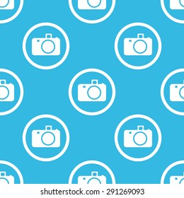 Image of camera in circle, repeated on blue background