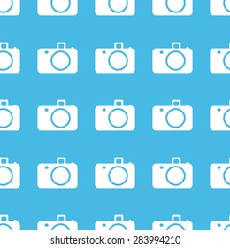 Image of camera, repeated in straight lines on blue background