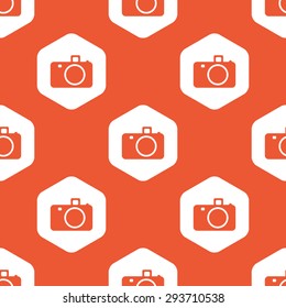 Image of camera in white hexagon, repeated on orange background