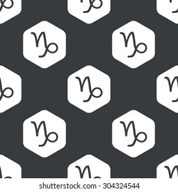 Image of Capricorn zodiac symbol in hexagon, repeated on black