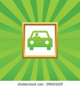 Image of car with driver in golden frame, on green abstract background