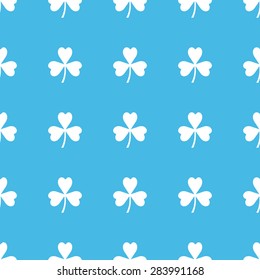 Image of clover leaf, repeated in straight lines on blue background