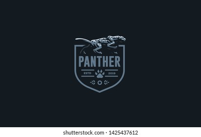 The image of a coguar or panter or leopard in a minimalist style.  Vector illustration