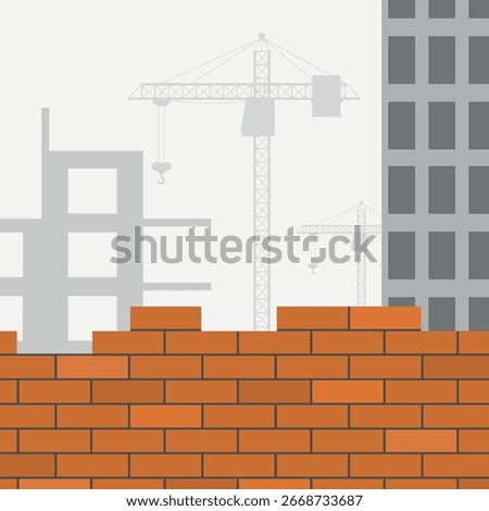 Image of construction site with brick wall and buildings under construction with crane.