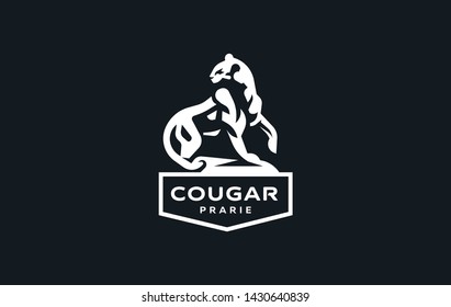 The image of a cougar or panther or leopard in a minimalist style.  Vector illustration