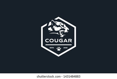 The image of a cougar or panther in a minimalist style. Vector illustration