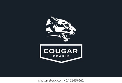 The image of a cougar or panther in a minimalist style. Vector illustration