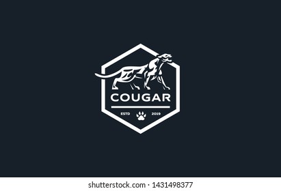 The image of a cougar or panther in a minimalist style. Vector illustration