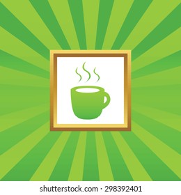 Image of cup with hot drink in golden frame, on green abstract background